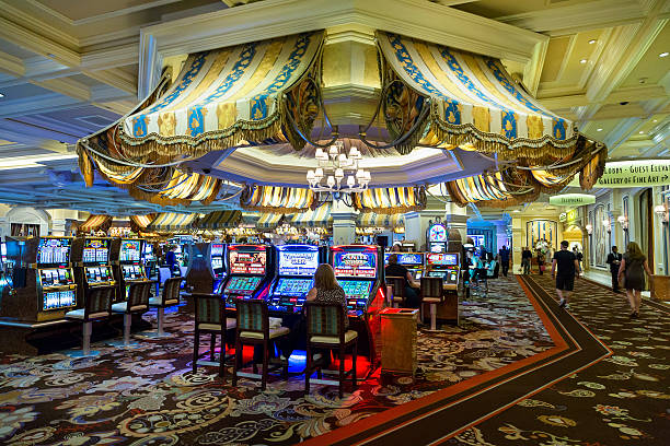 kencana slot app interface showing live roulette table with dealer, bet slip, and chat panel on a mobile screen